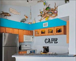 Entire Kitchen Set - Wood & Glass Cabinets, Counter w. White double sink, and Facuet