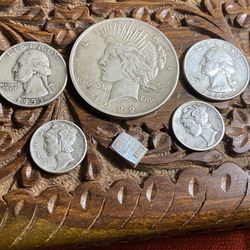 Lot of silver peace dollar two mercury dimes two Both quarters with Denver