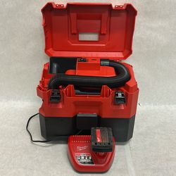 Milwaukee wet dry vac includes charger and 4.08H battery pack