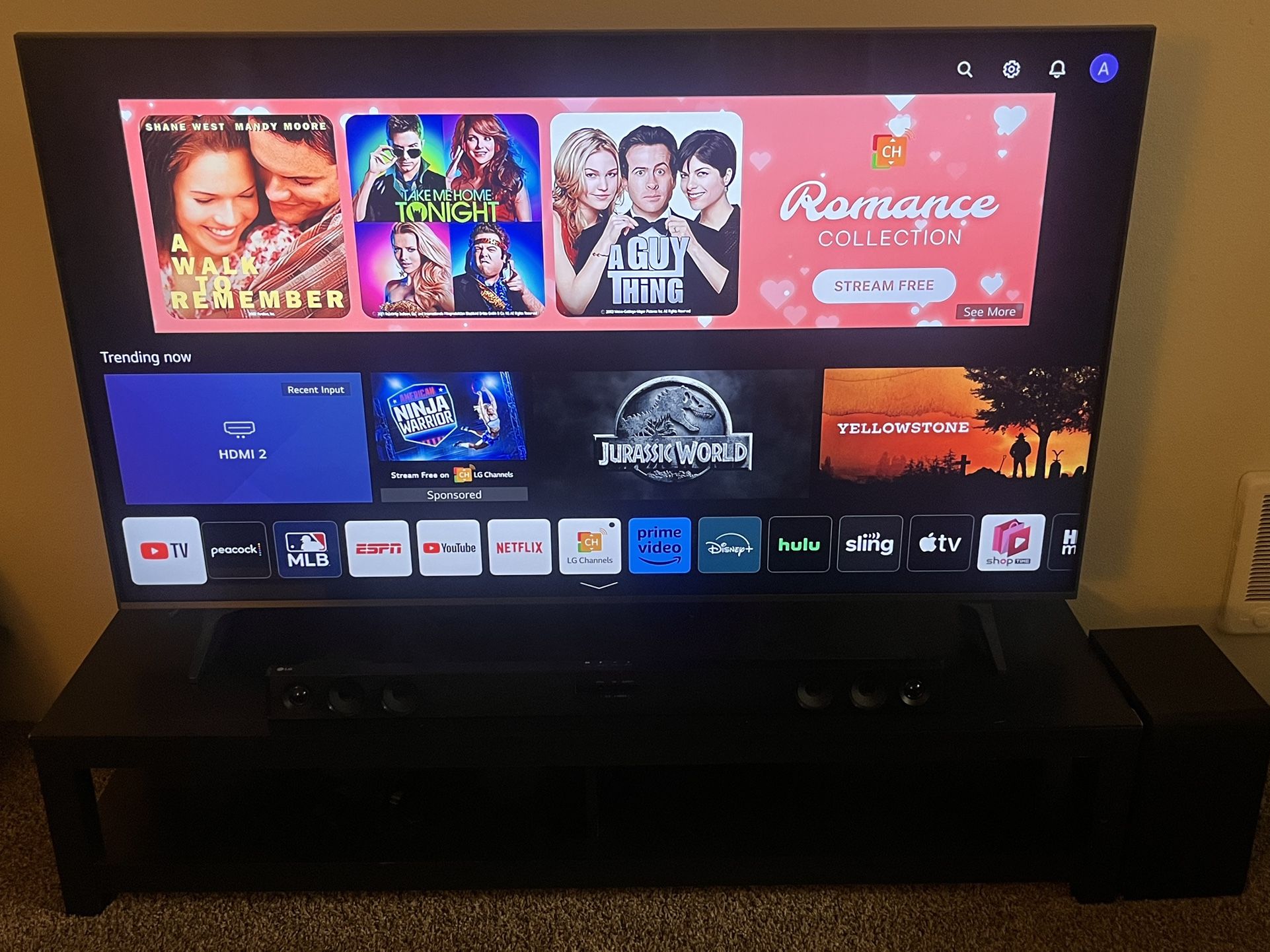 65 Inch LG Smart TV With Sound Bar And TV Stand