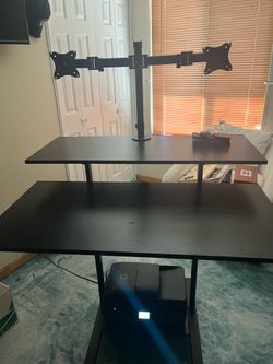 Desk-rolling with 2 monitor attachments