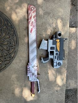 Replica bolt pistol and chainsword