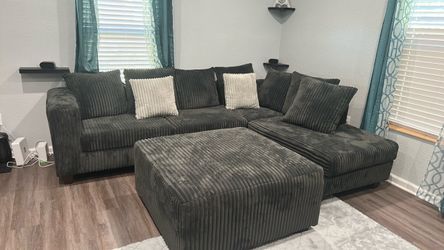 Almost New comfortable L shaped sectional with ottoman