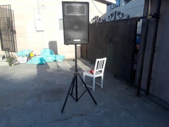 On stage stands speaker stand