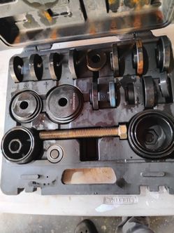 A bunch of tool kits couple macs and some harbor freight
