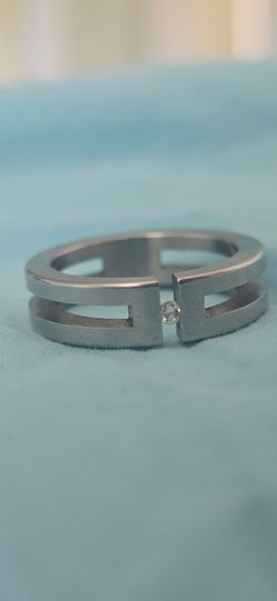 XEN stainless steel tension-set diamond ring