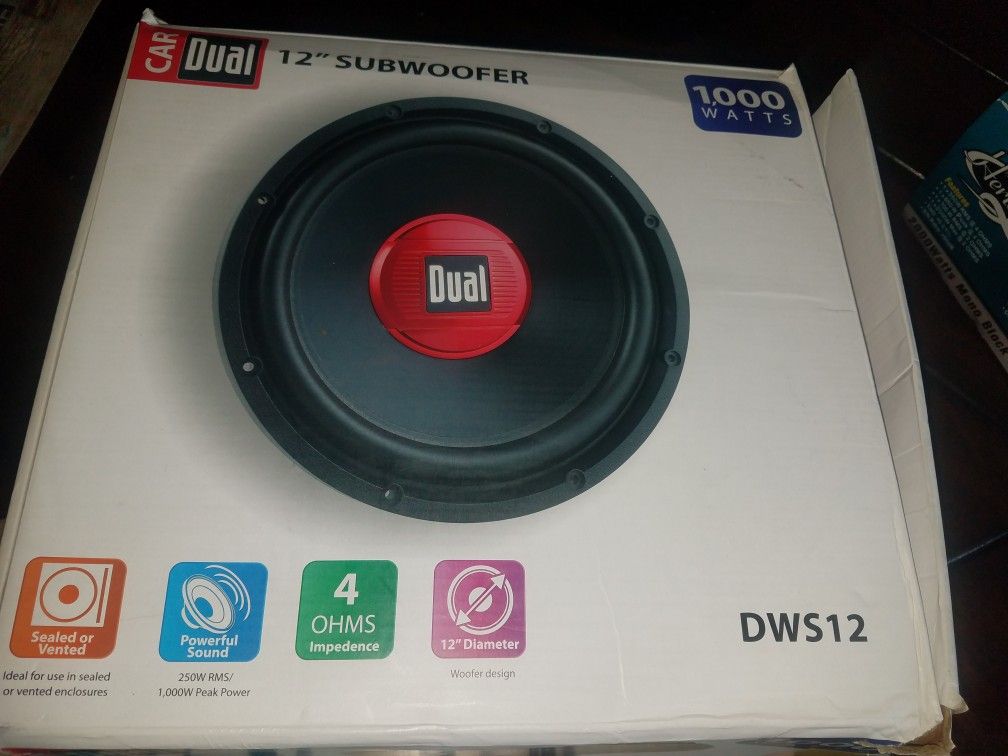12" subwoofer and 2000 watt amplifier *new in box*