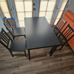 Ikea Dinning Table And Stefan Chairs 
