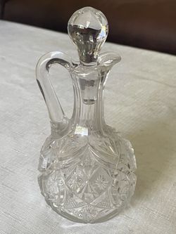 American Brilliant Period cut glass cruet with a stopper.