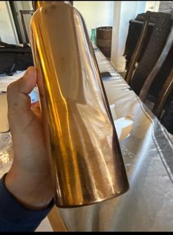 Dented Copper Bottle