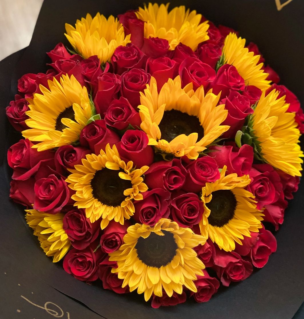 Roses And Sunflowers