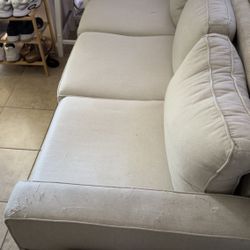 Beige Couch With Ottoman