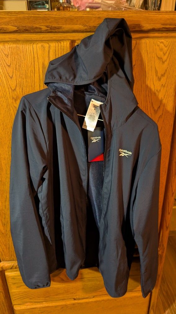 NWT Reebok training jacket, size S.