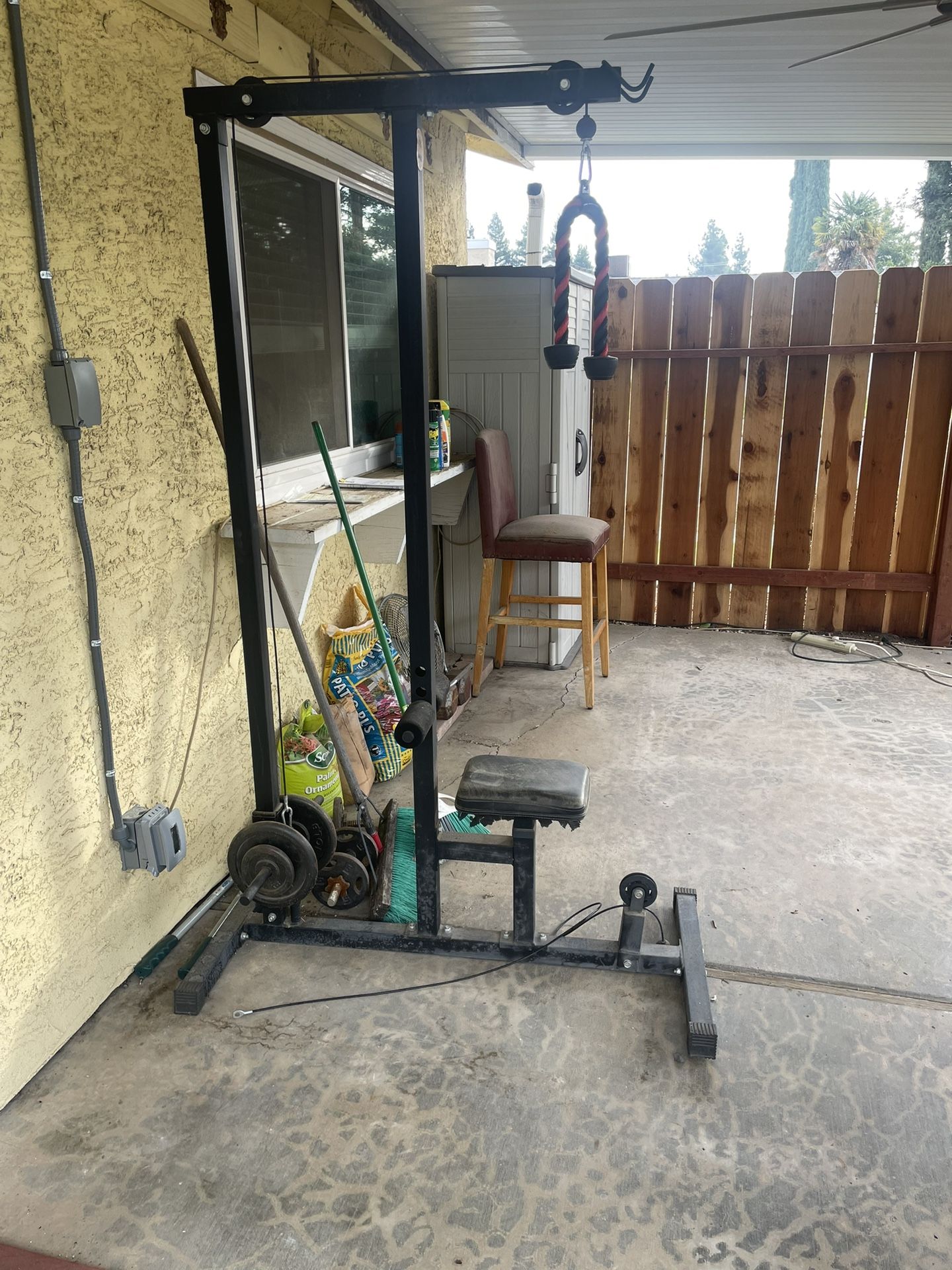 Elliptical And Pull Down Or Curl Cable Machine
