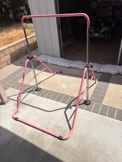 Gymnastics bar and mat