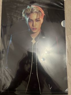 K-pop folder of EXO Kim Jongin (Kai)  with Blonde Hair and a Black Top