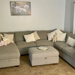 Gray Sectional Couches & Ottoman (Decorations Not Included)