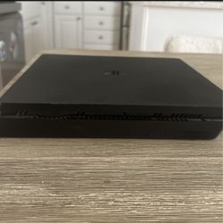 ps4 slim good condition with controller and cords 