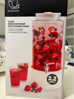 Glass drink  dispenser with ceramic stand