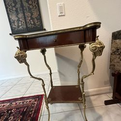 antiqu table,gold brass  ram  excellent condition originally $400, sells$200