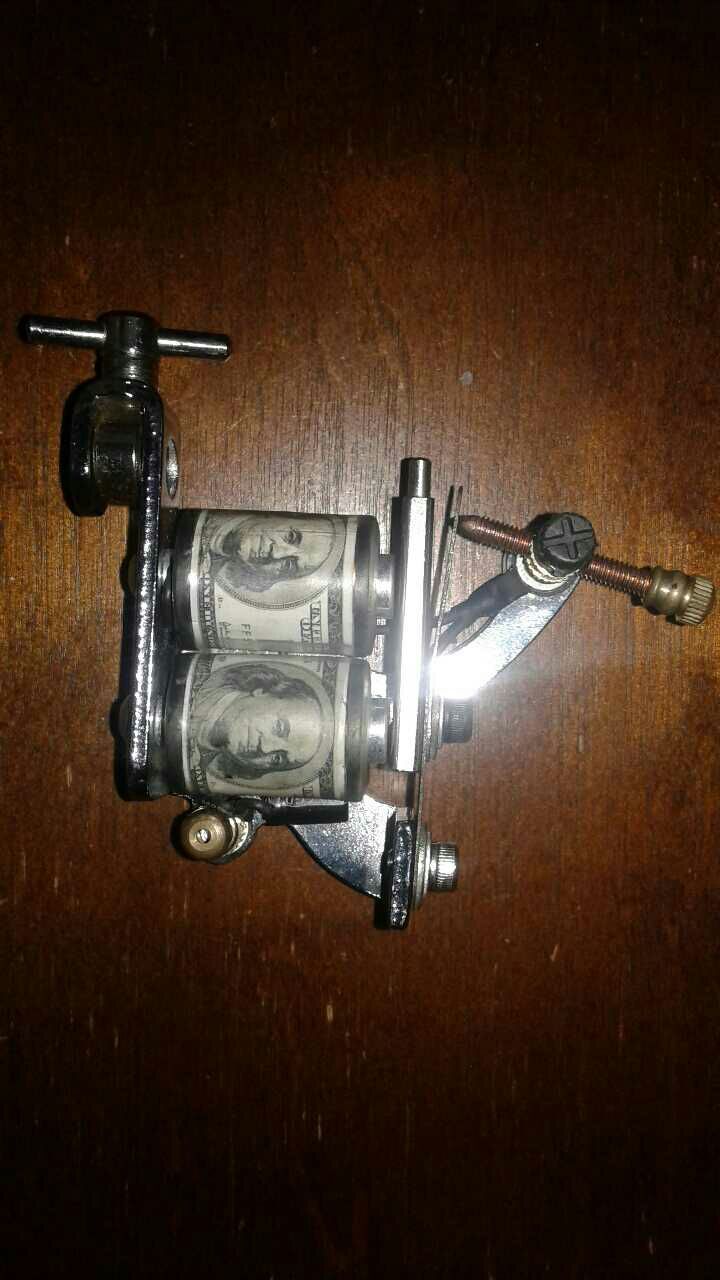 Ben Franklin $100 dollar bill tattoo gun