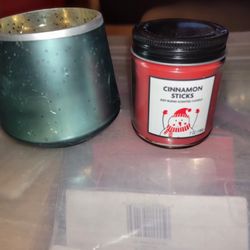 NEW CANDLE AND A CANDLE HOLDER.  