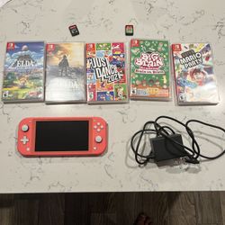 Nintendo Switch Lite – Coral w 7 games 