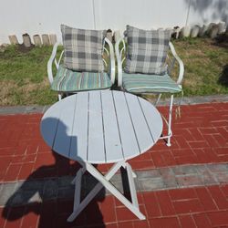 A Beautiful High Table With Two Chairs 