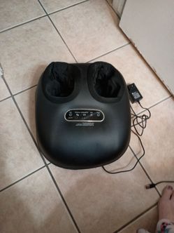 Heated foot massager
