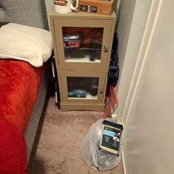 Small Cabinet With Inside Glass Shelves.