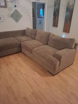 Large sectional couch and ottoman