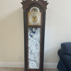 Grandfather clock,  Medium Brown Wood Over 6ft. tall 