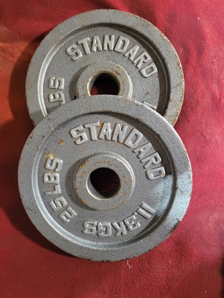 2" HOLE OLYMPIC STANDARD PLATES 50LBs.      2-25s. 
11525 S HALSTED DUNKIN DONUTS/7111.S WESTERN WALGREENS 
DELIVERY AVAILABLE 
50$  CASH ONLY AS IS 