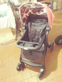 Stroller with retractable sun shade.