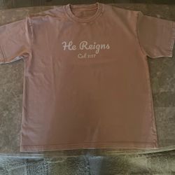 “He Reigns” Pink oversized tee