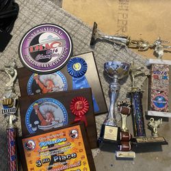 Bunch of old karate gear and trophy's. 