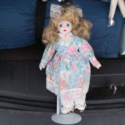 Porcelain Doll And Stand