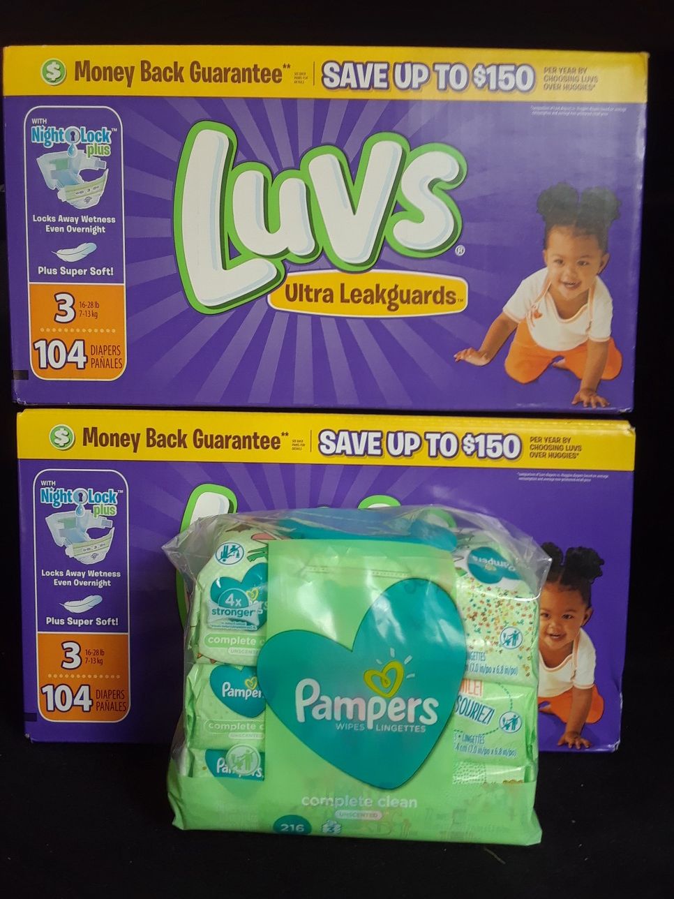 2-104 counts size 3 LUV diapers & 216 counts Pampers wipes