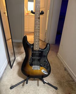 Squier Eléctric Guitar and Fender Amp