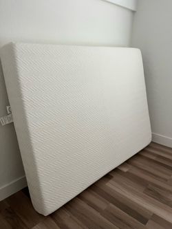 Queen size mattress- barely used.
