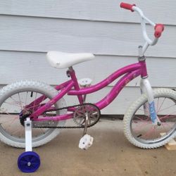 Girls bicycle 16". Training wheels