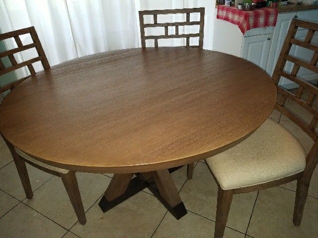 52" round table uses 72" table cloth with 4 chaiirs