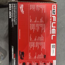 Milwaukee M12 DA sander Wireless With A Charger And 2 Battery Packs.