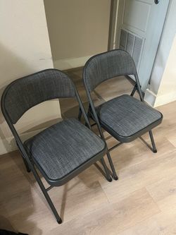 Foldong chairs padded 2no.s ( 30$ each )