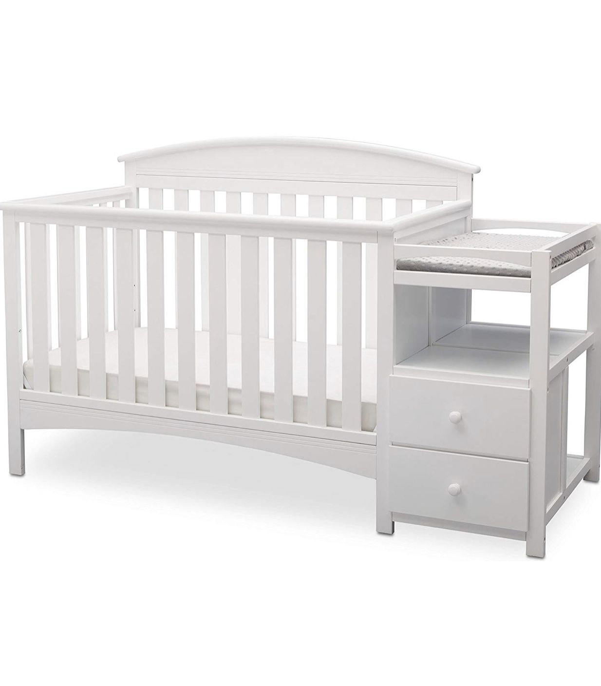 White wooden crib with changing table attached