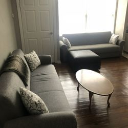 2 - Gray Couches With Under Storage & Fold Into A Bed For Sale 