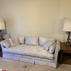 Sofa, end tables, and lamps
