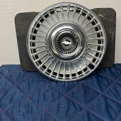 Three 14inch 1963 Chevrolet Impala Hub Caps.