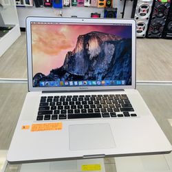 Apple MacBook Pro 15 inch , 4GB ram , 500GB hard drive storage, it comes with charger 