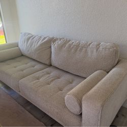 Light Beige Tufted Ashley Sofa + Bolster Pillows — Very Good Condition